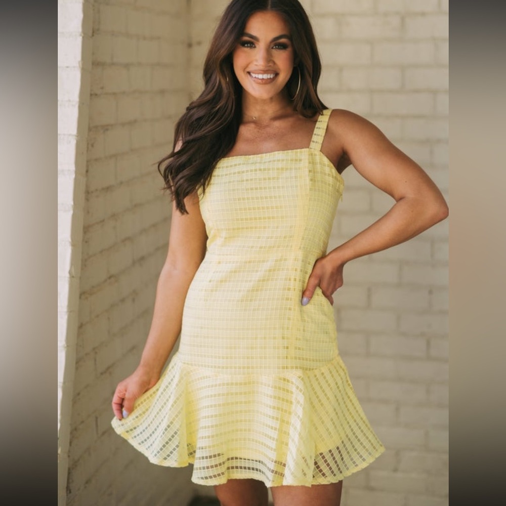 These ThreeRyder peplum mini dress